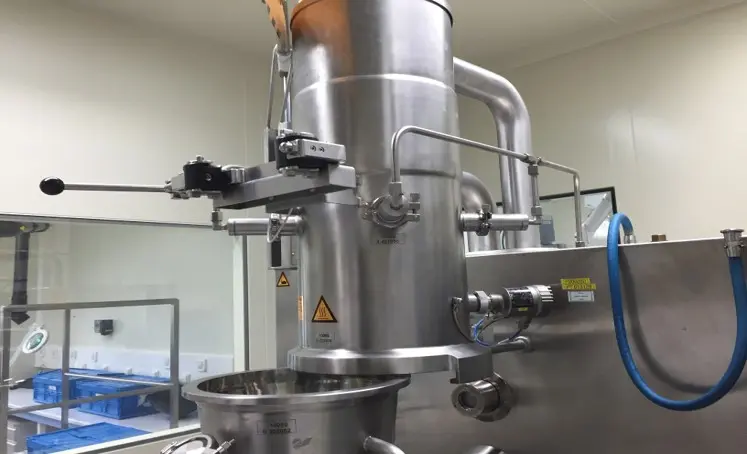 Stainless steel pharmaceutical drying and processing equipment installed in a controlled cleanroom environment